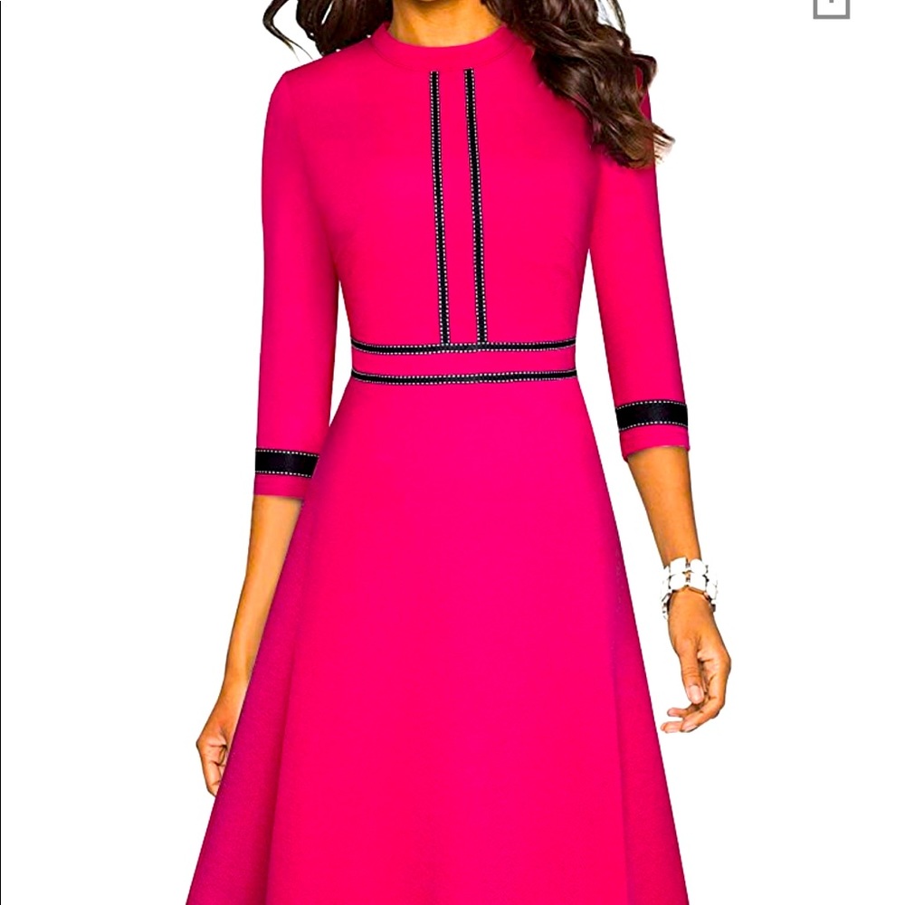 Pink dress with black striped detail.